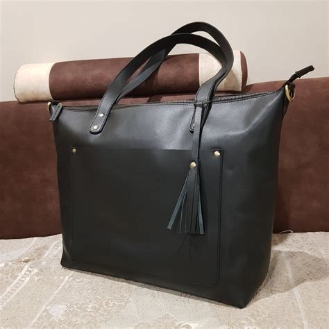 Nefrukhan Large Tote Bag .